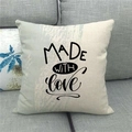 Detail of linen cushion cover featuring black MADE WITH LOVE text and blue brush stroke - 45x45cm / Stripe MADE WITH love Style