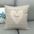 Linen pillowcase with love you text and geometric heart on a gray fabric sofa - Geometric Line Heart Love You (11)