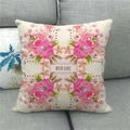 Close-up of linen pillow cover featuring floral patterns and 'WITH LOVE' text on a sofa - Purple Radial Floral Style (10)
