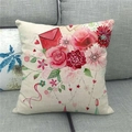 Close-up of linen pillow cover with red roses and love script on a gray fabric sofa - Envelope Rose Heart Decor Style (12)