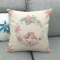 Linen square pillow case featuring watercolor floral wreath and red birds on grey sofa - Watercolor Wreath Birds Style (14)