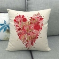 Close-up of linen pillow cover featuring floral heart design and gold text detail - Gold Polka Dot Flower Heart Style (17)
