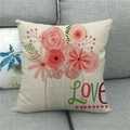 Close-up of linen pillow cover with floral pattern and LOVE text on a grey sofa - Carnation Rose LOVE Letter Style (18)