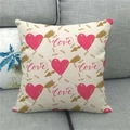 Close-up of linen pillow cover featuring pink hearts and love pattern on a gray sofa - Love Theme Repeat Print(15)