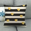 Close-up of linen pillowcase featuring black and white stripes with gold heart patterns - Striped Gold Heart(17)