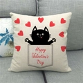 Detailed view of linen Valentine's Day pillowcase with cat and heart on sofa - Black Cat in Pocket Style (10)