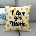 Close-up of linen pillow cover with yellow tulips and I love you mom text on gray sofa - 45x45cm / Tulip Polka Dot Style (5)