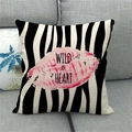 Close-up of zebra print linen pillowcase featuring a pink lip and Wild at Heart text - 45x45cm / Fashion Lips Style (17)