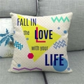 Linen pillow cover with geometric pop art patterns and Fall in Love text on gray sofa - Pop Geometric Slogan Style (20)