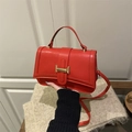 Red quilted leather handbag with gold H buckle and adjustable shoulder strap for women - Red