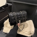 Chic black quilted crossbody bag with silver chain strap and polished metal lock - Black