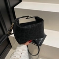 Chic black leopard print crossbody bag with gold buckle and textured suede finish - Black