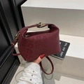 Small crossbody bag in burgundy leopard embossed matte finish with gold buckle detail - Red