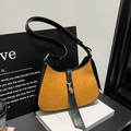 Retro mustard yellow suede crescent bag with black leather straps and metal hook detail - Brown
