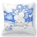 Detail of soft peach skin cushion cover featuring hand-drawn rabbits and winter birds - Blue and White Illustration Bunny and Bird Style (1)