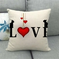Close-up of linen pillowcase with LOVE print and cat silhouette on grey sofa - Black Cat Silhouette Red Heart LOVE Style (7)