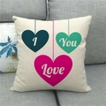 Close-up of linen pillowcase featuring three colored hearts and I Love You text detail - Hanging Tricolor Hearts I Love You Style (13)