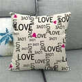 Detail shot of linen pillowcase with black LOVE print and pink heart on gray sofa - Modern Simple Love Heart Style (7)