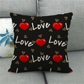 Close-up of black linen pillowcase with Love script and red heart on a sofa - Black Base Red Heart Love Style (10)