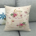 Close-up of linen pillowcase with floral wedding cake design and Love text on gray sofa - 18x18 Inch / Three-Layer Cake and Heart Flower Style (1)