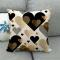 Linen Valentine heart pillow cover with black and gold patterns on a gray sofa - Black Gold Pop Heart Mix Style (16)