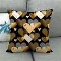 Detailed close-up of a black linen pillowcase with diverse gold heart patterns on a sofa - Black Base Fashion Modern Heart Style (17)