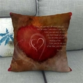 Macro detail of linen pillow cover featuring red heart pattern and vintage poem text - Retro Red Verses (10)
