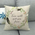 Close-up of linen pillowcase with Love will set you free text on grey sofa - 18x18 Inch / Wreath and Love Will Set You Free Style (5)