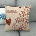 Close-up of linen cushion cover with husband text and heart button on gray sofa - Husband Theme Verses (15)