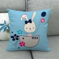 Detailed close-up of light blue linen pillow case with cute rabbit and LOVE design on a sofa - 18x18 Inch / Cartoon Rabbit Striped Basket Illustration LOVE Style (13)