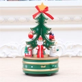 Rotating wooden Christmas music box with Santa Claus and tree decorations for holiday gifts - Green