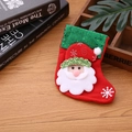 Detail of red Christmas stocking with sequins, Santa Claus figure and white embroidery - Sequin Santa Claus / Small