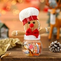 Mini Christmas gingerbread man candy jar with festive knitted hat and clear round base - White Hat Style