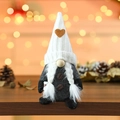 Detail of knitted gnome decoration featuring coffee beans and a miniature coffee cup - White Braids Style