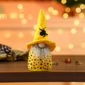 Handmade Halloween gnome with yellow spider hat and gray beard on rustic wood background - Yellow Style
