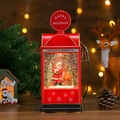 Dettaglio del mappamondo di neve natalizio a pompa di benzina vintage con luci a LED - Babbo Natale e Renna