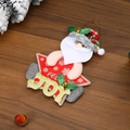 Dettaglio stella di Babbo Natale con lettere JOY dorate su sfondo di legno scuro strutturato - Babbo Natale