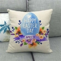 Federa per cuscino in lino con uovo di Pasqua blu e fiori su un divano grigio - Stile Floreale Forma Uovo Blu (13)