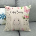Detail of linen cushion cover with Easter Bunny print and floral texture on a gray sofa - 45x45cm / Easter Bunny Gray Rabbit Style (7)