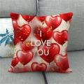 Detail of linen pillowcase with red heart balloons and I LOVE YOU text on gray sofa - Heart Balloons I Love You Style (6)