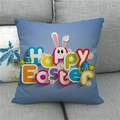 Close-up of Happy Easter linen pillowcase with colorful eggs and rabbit on blue fabric - Bright Blue Happy Easter with Bunny