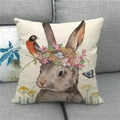 Detail of linen Easter pillow cover with watercolor rabbit, bird nest and floral motifs - Linen Grey Rabbit with Bird's Nest