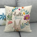 Linen pillow cover with 'hello Spring' text, brown rabbit, and floral garden illustration - Off-white Hello Spring Brown Rabbit