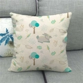 Close-up of linen Easter pillow cover featuring cartoon rabbit and trees on grey sofa - Nordic Minimalist Gray Rabbit Style (4)