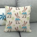 Linen Easter pillow cover with bunny pattern displayed on a sofa for home decor - Bow Tie Rabbit With Leaves Style (6)