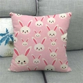 Detail of pink linen pillowcase featuring a dense white cartoon bunny pattern on a sofa - Pink Background White Rabbit Head Style (18)