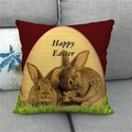 Deep red Easter throw pillow cover with Happy Easter bunny prints on a grey sofa - Easter Red Background Rabbit (18)