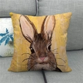 Artistic hand-painted rabbit on yellow linen pillowcase displayed on a grey sofa - Bright Yellow Background Artistic Rabbit (10)