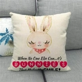 Detailed close-up of a linen Easter pillow cover featuring a cute bunny design on a sofa - BUNNIE Heart Logo Cartoon Rabbit (19)