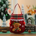 Close-up of red burlap Christmas gift bag with 3D reindeer motif and snowflake details - Elk